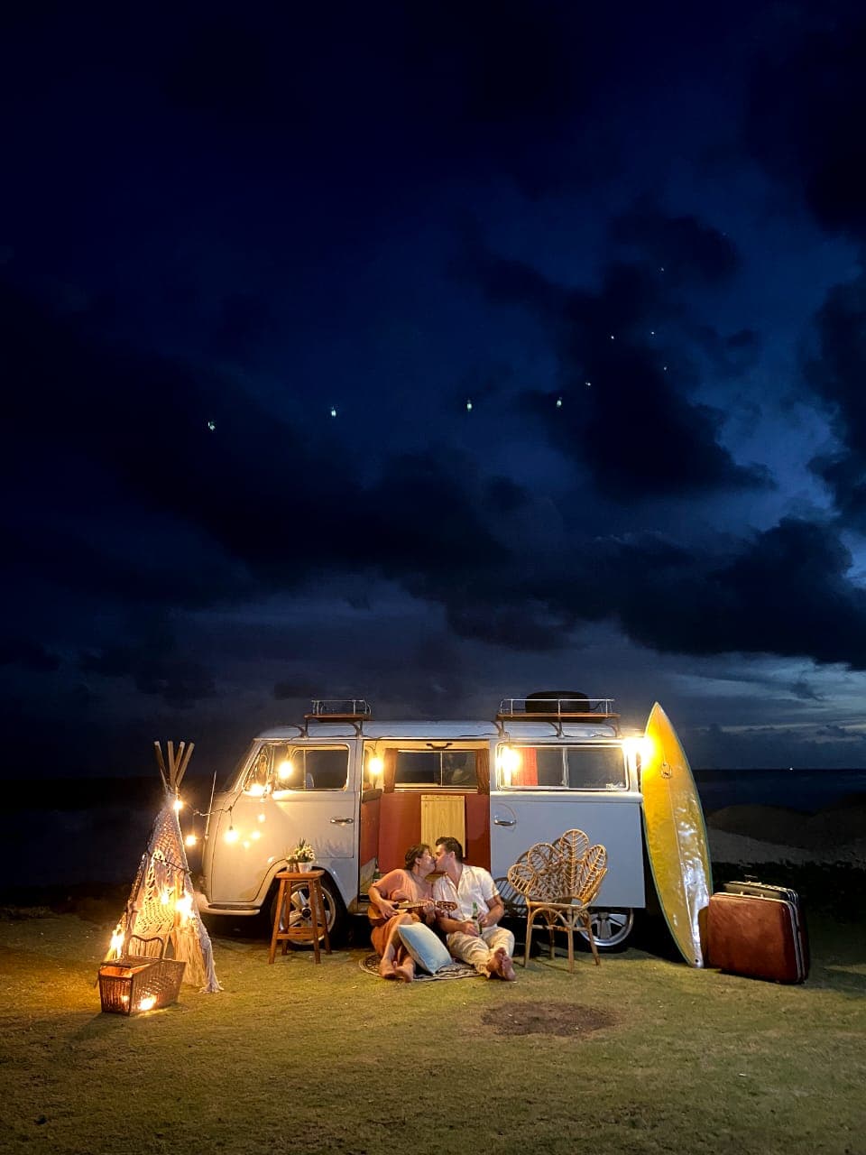 Me and my wife having a night picnic on the meadow in Bali, Indonesia